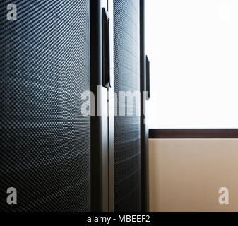 Rack housing servers in computer server farm Stock Photo - Alamy