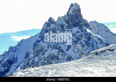 A snow covered mountain peak Stock Photo