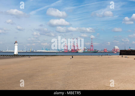 Looking over the beach at New Brighton and the lighthouse at the Wirral Peninsula to the river Mersey. Stock Photo