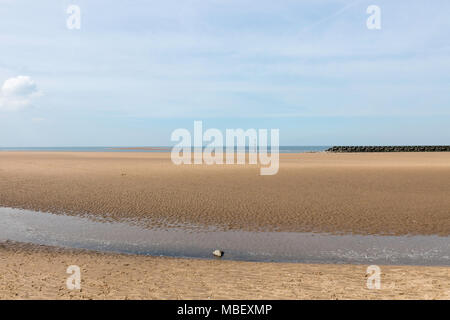 The empty beach at New Brighton on the Wirral Peninsula, England, UK Stock Photo