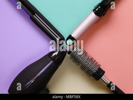 hairdresser's tools - hair drier, curling iron, hairbrush Stock Photo