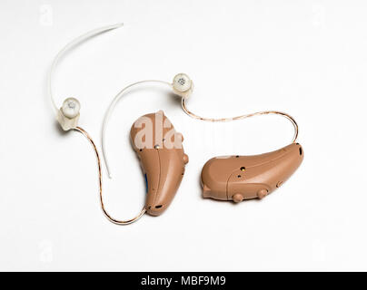 Close up of a tiny modern hearing aid Stock Photo