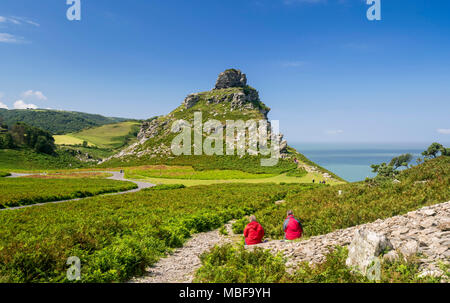Walkers taking a rest while hiking in Exmoor National Park, Devon, England, UK Stock Photo