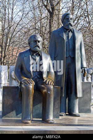 Statue commemorating Karl Marx and Friedrich Engels, authors of the Communist Manifesto, as two elderly gentlemen, popularly known as the Pensioners Stock Photo