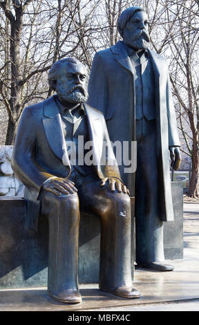 Statue commemorating Karl Marx and Friedrich Engels, authors of the Communist Manifesto, as two elderly gentlemen, popularly known as the Pensioners Stock Photo