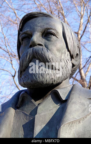 Detail of head of Friedrich Engels, joint author, with Karl Marx, of the Communist Manifesto, from statue of the two men in Marx Engels Forum, Berlin. Stock Photo