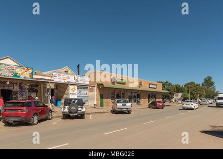 LADYBRAND, SOUTH AFRICA - MARCH 12, 2018: A street scene with businesses and vehicles in Ladybrand, a town in the eastern Free State Province near the Stock Photo