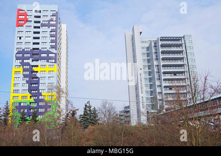 21 storey pre-fabricated concrete tower block built by GDR government, given new life by brightly-coloured abstract design by Gustavo Penalver Vico Stock Photo