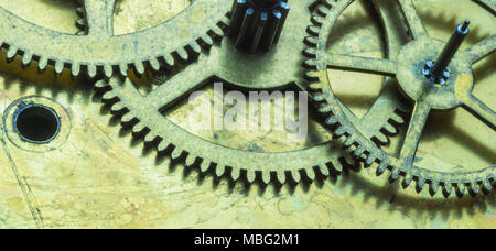 Beautiful macro close-up on clockwork mechanism with gears. Illustrative concept of machinery, technology engineering, thinking, intellectual concept. Stock Photo