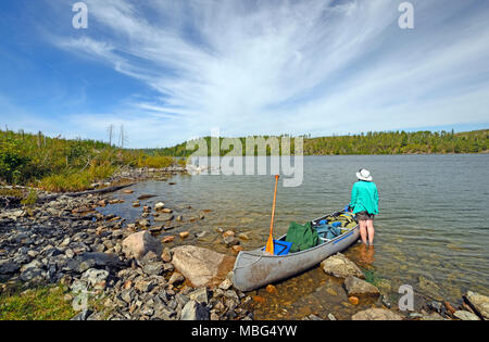 Canoer Heading onto Knife Lake in the Boundary Waters Stock Photo