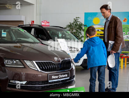 Voronezh, Russia - June 04, 2017: Dad and son choose a new car Stock Photo