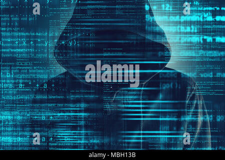 Cybersecurity, computer hacker with hoodie and obscured face, computer code overlaying image Stock Photo