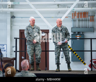 U.S. Air Force Col. Daniel Gabrielli, commander of the 133rd Airlift Wing, introduces Lt. Gen. L. Scott Rice, director, Air National Guard, during an all-call event in St. Paul, Minn., March 25, 2018. Rice and Chief Master Sgt. Ronald Anderson, Command Chief of the Air National Guard, are touring all the Air National Guard units and answering questions relating to the airmen’s career fields. Stock Photo