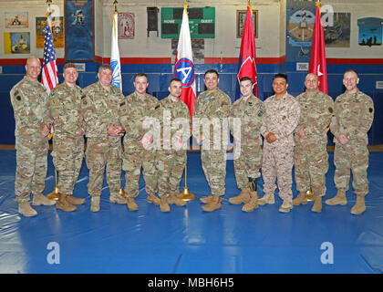 CAMP ARIFJAN, Kuwait — Brig. Gen. Stephen Radulski (right), 28th Infantry Division Deputy Commander – Operations, Task Force Spartan; and Headquarters and Headquarters Battalion Command Sgt. Maj. Jeremy Strathmeyer (left) served as hosts for an Operation Proper Exit town hall event here April 3, 2018. Wounded Warriors participating in the event are, from left: Retired Sgt. Franz Walkup, retired Staff Sgt. John Hosea, Sgt. Jonathan Harmon, retired Staff Sgt. Jaymes Poling, Medal of Honor recipient retired Master Sgt. Leroy Petry, retired Spc. Justin Lane, Retired Marine Sgt. Hubert Gonzalez and Stock Photo