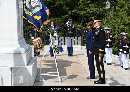 U.S. Army Maj. Gen. Michael L. Howard, commanding general, Joint Force Headquarters - National Capital Region and the U.S. Army Military District of Washington and Kersti Kaljulaid, President of Estonia, renders honor during an Armed Forces Full Honor Wreath Laying Ceremony at the Tomb of the Unknown Soldier, in Arlington National Cemetery, Va., April 4, 2018. Stock Photo