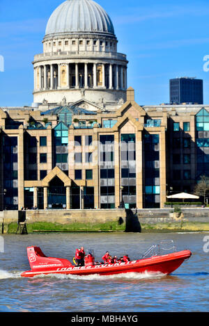 London, England, UK. Thames Rockets speedboat tour on the River Thames, passing St Paul's Cathedral Stock Photo