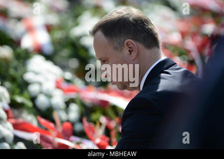 Warsaw, Poland. 10th Apr, 2018. Polish President Andrzej Duda attends the ceremony marking the eighth anniversary of the plane crash in Smolensk of Russia at the Powazki Military Cemetery in Warsaw, Poland, on April 10, 2018. Poland marked on Tuesday the eighth anniversary of the plane crash in Smolensk of Russia in which 96 Polish people, including the then-Polish President Lech Kaczynski, were killed. Credit: Jaap Arriens/Xinhua/Alamy Live News Stock Photo