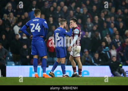 Birmingham, Midlands, UK. 10th April, 2018. Jack Grealish of Aston Villa gets a slap from Joe Bennett of Cardiff city.  EFL Skybet Championship match, Aston Villa v Cardiff City at Villa Park in Birmingham on Tuesday 10th April 2018.  this image may only be used for Editorial purposes. Editorial use only, license required for commercial use. No use in betting, games or a single club/league/player publications. pic by  Andrew Orchard/Andrew Orchard sports photography/Alamy Live news