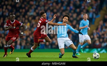 Manchester, UK. 10th Apr, 2018. Liverpool's Trent Alexander-Arnold (2nd L) vies with Manchester City's Leroy Sane (2nd R) during the UEFA Champions League quarterfinal second leg soccer match between Manchester City and Liverpool in Manchester, Britain, on April 10, 2018. Liverpool won 5-1 on aggregate and advanced to the semifinal. Credit: Xinhua/Alamy Live News Stock Photo