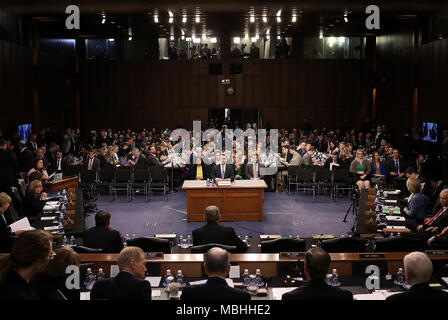 Facebook co-founder, Chairman and CEO Mark Zuckerberg testifies before a combined Senate Judicary and Commerce committee hearing in the Hart Senate Office Building on Capitol Hill April 10, 2018 in Washington, DC. Zuckerberg, 33, was called to testify after it was reported that 87 million Facebook users had their personal information harvested by Cambridge Analytica, a British political consulting firm linked to the Trump campaign. Credit: Win McNamee/Pool via CNP /MediaPunch Stock Photo