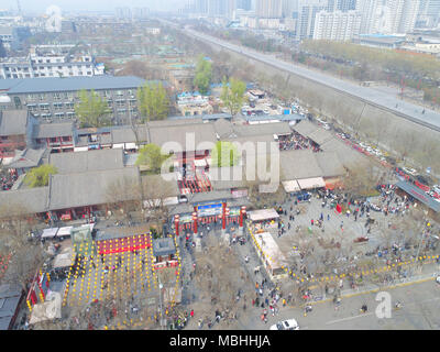 April 9, 2018 - Xi'An, Xi'an, China - Xi'an, CHINA-9th April 2018: Numerous tourists wait in a long line to experience 'drink wine and break the bowl' in Xi'an, northwest China's Shaanxi Province. Credit: SIPA Asia/ZUMA Wire/Alamy Live News Stock Photo