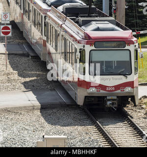 Calgary, Alberta, Canada. 24th Aug, 2016. A Calgary Transit (CTS) light rail (LRT) C-Train departs from Fish Creek-Lacombe station on the transit system's ''Red Line, '' Calgary, Alberta, Canada. Credit: Bayne Stanley/ZUMA Wire/Alamy Live News Stock Photo