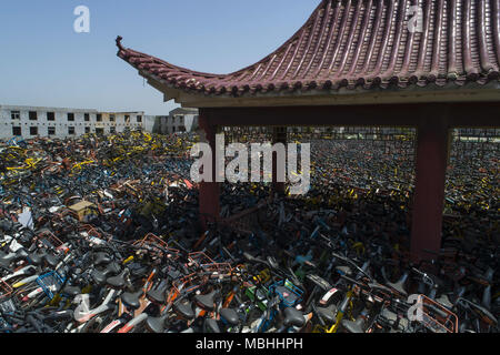 Wuhan, Wuhan, China. 9th Apr, 2018. Wuhan, CHINA-9th April 2018: Numerous abandoned public shared bikes can be seen in Wuhan, central China's Hubei Province. Credit: SIPA Asia/ZUMA Wire/Alamy Live News Stock Photo