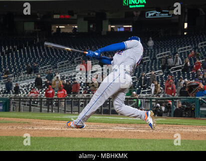 Washington, USA. 09th Apr, 2018. New York Mets center fielder Juan Lagares (12) singles in the twelfth inning against the Washington Nationals at Nationals Park in Washington, DC on Sunday, April 8, 2018. The Mets won the game 6-5. Credit: Ron Sachs/CNP (RESTRICTION: NO New York or New Jersey Newspapers or newspapers within a 75 mile radius of New York City) - NO WIRE SERVICE - Credit: Ron Sachs/Consolidated/dpa/Alamy Live News Stock Photo
