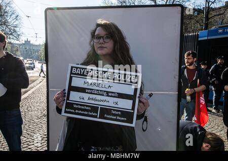 Munich, Bavaria, Germany. 11th Apr, 2018. Mariella (22) is a student and is worried about the PAG because she is an antifascist. The Green Party Youth (Gruene Jugend) of Munich, along with 120 members of the SPD, JuSos, Mut Bayern, and die Linke demonstrated against the forthcoming PAG, Police Assignment Laws that give police in Bavaria sweeping secret police-like powers that are alleged to be threats to Germany's model democracy. The CSU party claims the PAG is to protect democracy. Credit: ZUMA Press, Inc./Alamy Live News Stock Photo