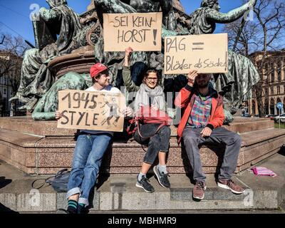 Munich, Bavaria, Germany. 11th Apr, 2018. Lilith (22) and Mariella (22), both students that worry about being put under general suspicion due to political and antifascist engagement. The Green Party Youth (Gruene Jugend) of Munich, along with 120 members of the SPD, JuSos, Mut Bayern, and die Linke demonstrated against the forthcoming Polizeiaufgabengesetze (PAG, Police Assignment Laws) that give police in Bavaria sweeping secret police-like powers that are alleged to be threats to Germany's model democracy. Credit: ZUMA Press, Inc./Alamy Live News Stock Photo