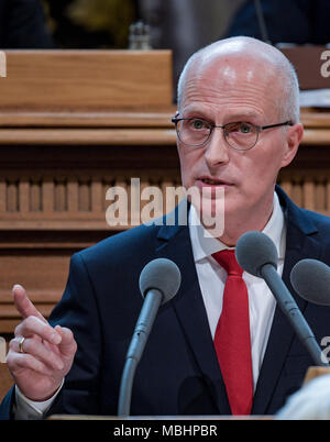 11 April 2018, Germany, Hamburg: Peter Tschentscher (SPD), mayor of Hamburg, speaking at the Hamburg Buergerschaft legislative assembly. Tschentscher gave his first government declaration. Photo: Axel Heimken/dpa Stock Photo