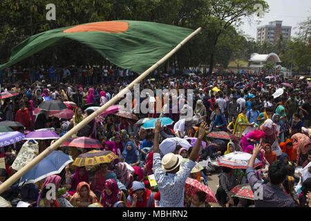 Dhaka, Bangladesh. 11th Apr, 2018. DHAKA, BANGLADESH - APRIL 11 : Bangladeshi students gather for a protest against quotas for certain groups of people in government jobs in Dhaka, Bangladesh on April 11, 2018.Tens of thousands of university students marched in cities across Bangladesh on April 11 in one of the biggest protests faced by Prime Minister Sheikh Hasina in her decade in power. Students fighting against a controversial policy that sets aside government jobs for special groups have united in mass protests rarely seen on such a scale in Bangladesh. (Credit Image: © Zakir Hossain C Stock Photo