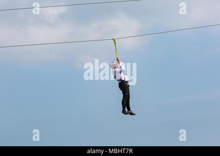 Bournemouth, Dorset, UK. 11th Apr, 2018. Celebrities take on Bournemouth zipline zipwire zip line zip wire ziplining from Bournemouth Pier to the beach. Pier to shore challenge ziplining from the pier to the beach below. Lord Brett McLean Credit: Carolyn Jenkins/Alamy Live News Stock Photo