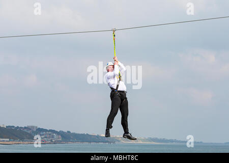 Bournemouth, Dorset, UK. 11th Apr, 2018. Celebrities take on Bournemouth zipline zipwire zip line zip wire ziplining from Bournemouth Pier to the beach. Pier to shore challenge ziplining from the pier to the beach below. Lord Brett McLean Credit: Carolyn Jenkins/Alamy Live News Stock Photo