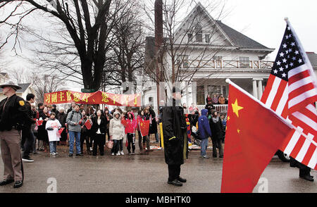 Muscatine, Iowa, USA. 15th Feb, 2012. A group of supporters carry Chinese and American flags during a visit by Chinese Vice President Xi Jinping to Muscatine, Iowa Wednesday February 15, 2012. Credit: Quad-City Times File/Quad-City Times/ZUMA Wire/Alamy Live News Stock Photo