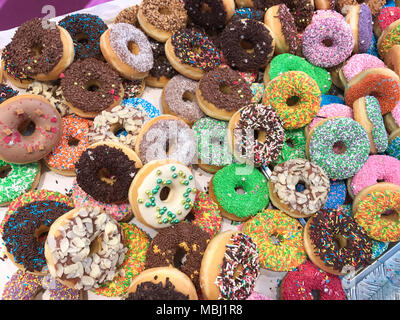 Set of assorted tasty donuts of different colors Stock Photo