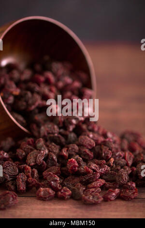 Dried Cranberries in a Wooden Bowl Stock Photo