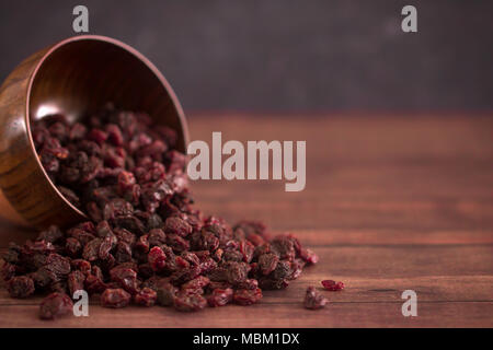Dried Cranberries in a Wooden Bowl Stock Photo