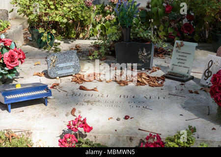 PARIS, FRANCE - SEPT 12, 2014: Gilbert Becaud grave in Pere-Lachaise cemetery, Paris, France Stock Photo