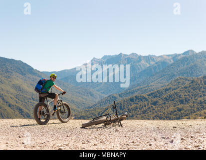 Image of man at sports bike on road Stock Photo