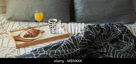 Baner Breakfast in Bed. Coffee and Croissants White Chocolate Food. Cup of Coffe or Tea. Orange juice. Stock Photo