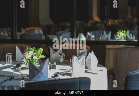 Fine table setting in a luxurious restaurant Stock Photo