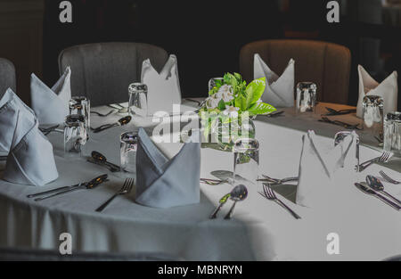 Fine table setting in a luxurious restaurant Stock Photo