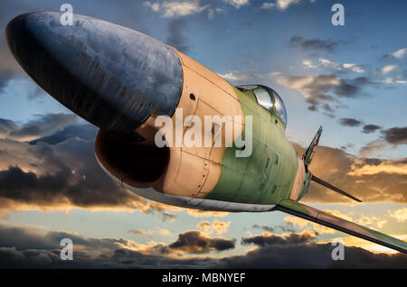 The North American F-86D Sabre Dog in flight at sunset time. It was an all-weather transonic jet. First flight: 22 December, 1949 Stock Photo