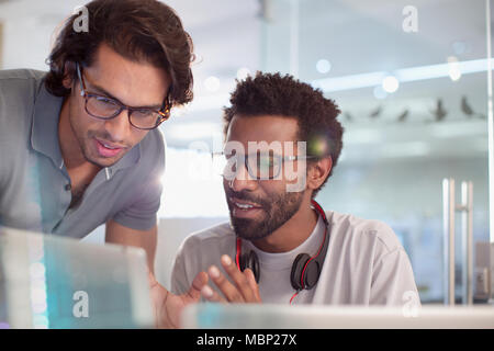 Creative businessmen using digital tablet in office Stock Photo