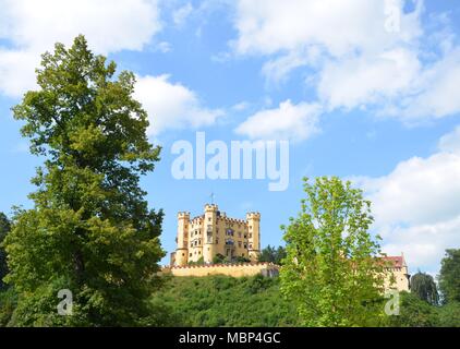 view of the Hohenschwangau castle near alpine village Schwangau in Bavaria, Germany Stock Photo