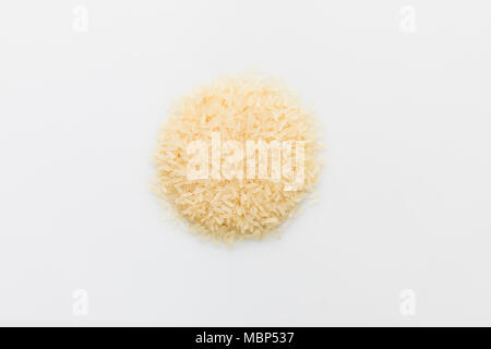 top view of heap of raw rice isolated on white Stock Photo