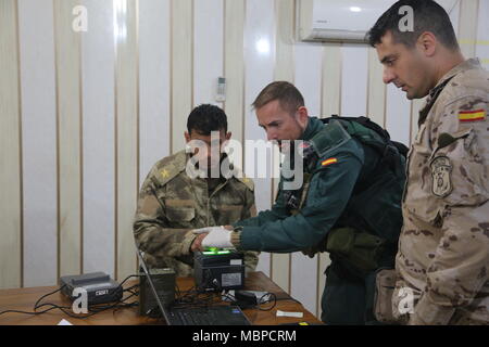 Operation Inherent Resolve is a multinational campaign initiated in 2014 to defeat the Islamic State group in Iraq and Syria. Coalition personnel conducted biometric enrollment procedures, including fingerprint collection, at Camp Besmaya, Iraq in January 2018. The archival image records identity processing as part of partner capacity building and security operations. Stock Photo