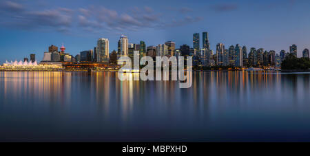 Night skyline of Vancouver downtown from Stanley Park Stock Photo