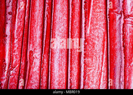Red bumpy wall stucco texture background, crumpled leather imitation Stock Photo